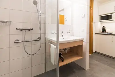 Ein Badezimmer in der Unterkunft Appartement Haus Zalim