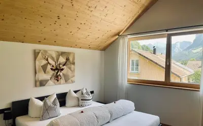 Ein Bett oder Betten in einem Zimmer der Unterkunft hus56
