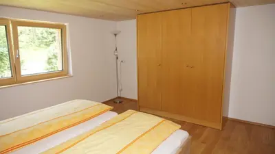 Ein Bett oder Betten in einem Zimmer der Unterkunft Haus Edeltraud