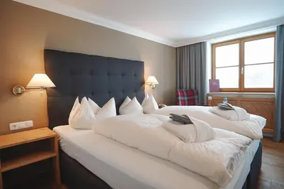 Ein Bett oder Betten in einem Zimmer der Unterkunft Hotel Acerina Superior