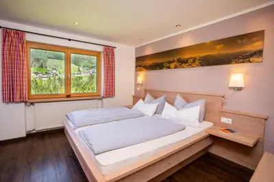 Ein Bett oder Betten in einem Zimmer der Unterkunft Im Höfle Ferienwohnungen