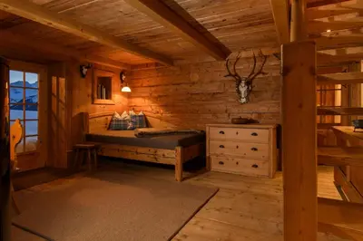 Ein Bett oder Betten in einem Zimmer der Unterkunft Chalet Berghaus Bartholomäberg