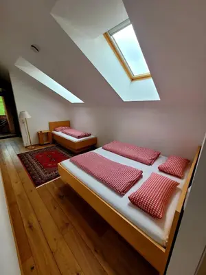 Ein Bett oder Betten in einem Zimmer der Unterkunft Hotel Alpenrose Ebnit