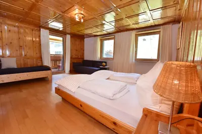 Ein Bett oder Betten in einem Zimmer der Unterkunft Haus Brügga