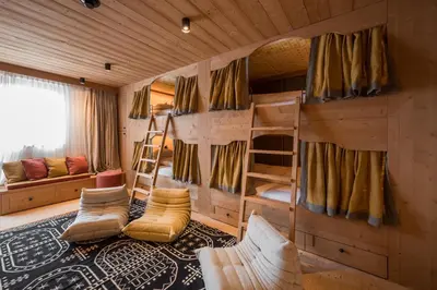 Ein Sitzbereich in der Unterkunft Chalet Mimi