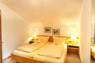 Ein Bett oder Betten in einem Zimmer der Unterkunft Villa Valluga