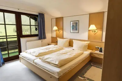 Ein Bett oder Betten in einem Zimmer der Unterkunft Villa Valluga