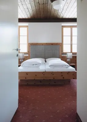 Ein Bett oder Betten in einem Zimmer der Unterkunft Gasthof Post