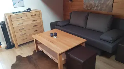 Ein Sitzbereich in der Unterkunft Ferienwohnung Apres Ski