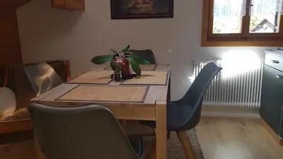 Ein Sitzbereich in der Unterkunft Ferienwohnung Apres Ski