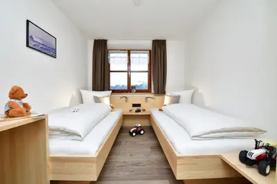 Ein Bett oder Betten in einem Zimmer der Unterkunft Ferienhof Sonne