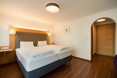 Ein Bett oder Betten in einem Zimmer der Unterkunft Hotel Cafe Lorenz