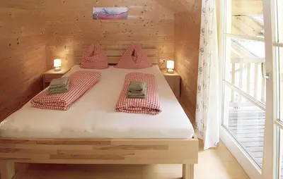 Ein Bett oder Betten in einem Zimmer der Unterkunft Ferienhaus Dalaas Am Arlberg