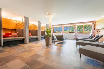 Ein Bett oder Betten in einem Zimmer der Unterkunft Hotel Alpenblume