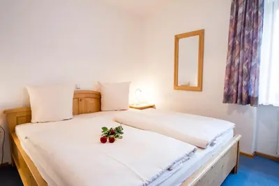 Ein Bett oder Betten in einem Zimmer der Unterkunft Haus Kristina