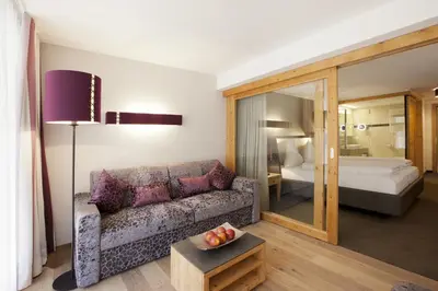 Ein Bett oder Betten in einem Zimmer der Unterkunft Hotel Walliserstube