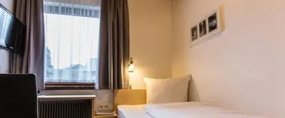 Ein Bett oder Betten in einem Zimmer der Unterkunft Gästehaus-Pension Barbara