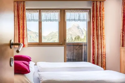 Ein Bett oder Betten in einem Zimmer der Unterkunft Haus Rothorn