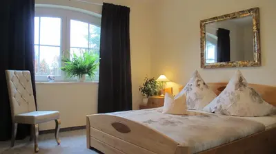 Ein Bett oder Betten in einem Zimmer der Unterkunft Alpentraum