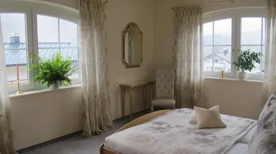 Ein Bett oder Betten in einem Zimmer der Unterkunft Alpentraum