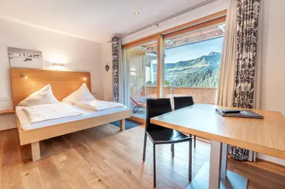 Ein Bett oder Betten in einem Zimmer der Unterkunft Appartementhaus Uga