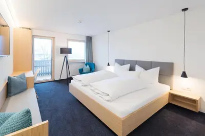 Ein Bett oder Betten in einem Zimmer der Unterkunft Pension Löwen