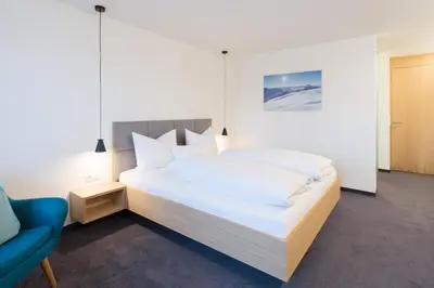 Ein Bett oder Betten in einem Zimmer der Unterkunft Pension Löwen