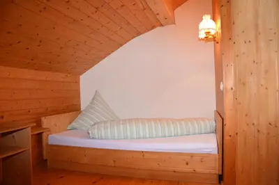 Ein Bett oder Betten in einem Zimmer der Unterkunft Bauernhof Schneider