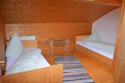 Ein Bett oder Betten in einem Zimmer der Unterkunft Bauernhof Schneider