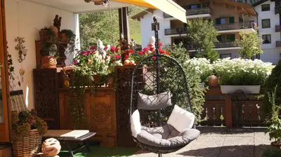 Ein Garten an der Unterkunft Pension Hartenfels