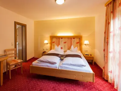 Ein Bett oder Betten in einem Zimmer der Unterkunft Pension Kilian