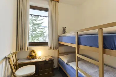 Ein Bett oder Betten in einem Zimmer der Unterkunft Hotel Bergheim