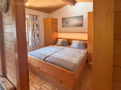 Ein Bett oder Betten in einem Zimmer der Unterkunft Apartment Sonnegg by Interhome