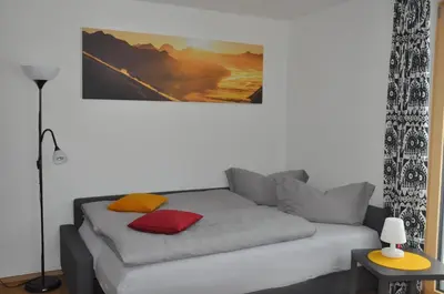 Ein Bett oder Betten in einem Zimmer der Unterkunft Ferienwohnung Wallner