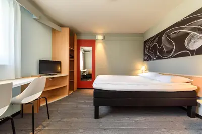Ein Bett oder Betten in einem Zimmer der Unterkunft Hotel Ibis Bregenz