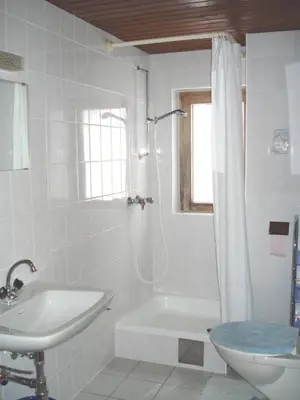 Ein Badezimmer in der Unterkunft Haus Mondspitze