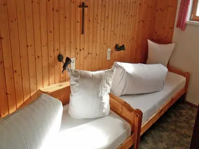 Ein Bett oder Betten in einem Zimmer der Unterkunft Chalet in Sibratsgfäll near Ski Slopes