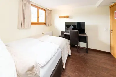 Ein Bett oder Betten in einem Zimmer der Unterkunft S'Matt 3