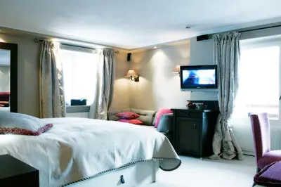 Ein Bett oder Betten in einem Zimmer der Unterkunft Hotel Berghof