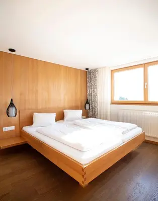Ein Bett oder Betten in einem Zimmer der Unterkunft Hotel & Wirtschaft Wälderhof
