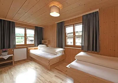 Ein Bett oder Betten in einem Zimmer der Unterkunft Kinderbauernhof