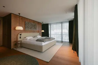 Ein Bett oder Betten in einem Zimmer der Unterkunft NEW Hotel Kristberg in Lech - new opening since December 2025