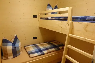 Ein Bett oder Betten in einem Zimmer der Unterkunft Lodge 5