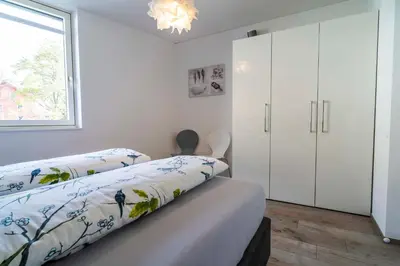 Ein Bett oder Betten in einem Zimmer der Unterkunft Zweite Heimat