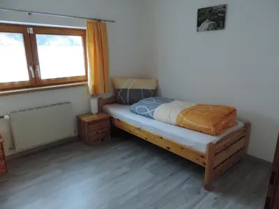 Ein Bett oder Betten in einem Zimmer der Unterkunft Ferienwohnung Rudigier Elke
