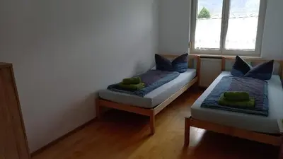 Ein Bett oder Betten in einem Zimmer der Unterkunft Dimai House No 31 Dornbirn Messe