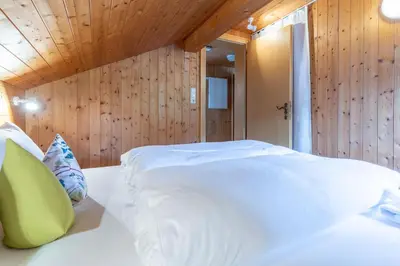 Ein Bett oder Betten in einem Zimmer der Unterkunft Ferienbauernhof Kohler