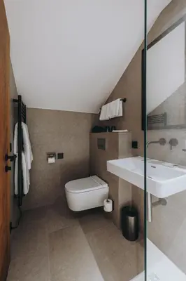 Ein Badezimmer in der Unterkunft Balma Restaurant Suites