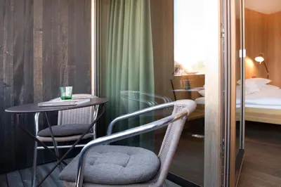 Ein Bett oder Betten in einem Zimmer der Unterkunft Krone Hittisau - Hotel & Restaurant im Bregenzerwald