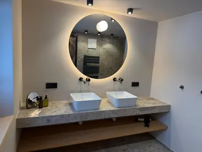 Ein Badezimmer in der Unterkunft Almrösle Apartments